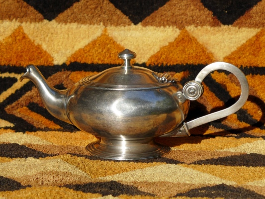A teapot made from polished pure m�tal extra-blanc (low-quality nickel silver)