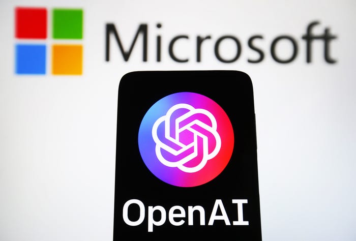 In this photo illustration, OpenAI logo of an artificial intelligence company is seen on a smartphone and Microsoft logo on a pc screen.