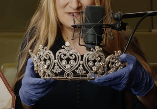 close up of a tiara next to a microphone