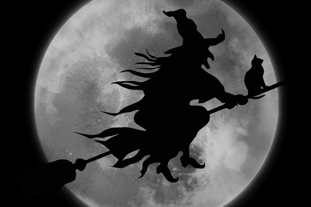 witch riding on a broom