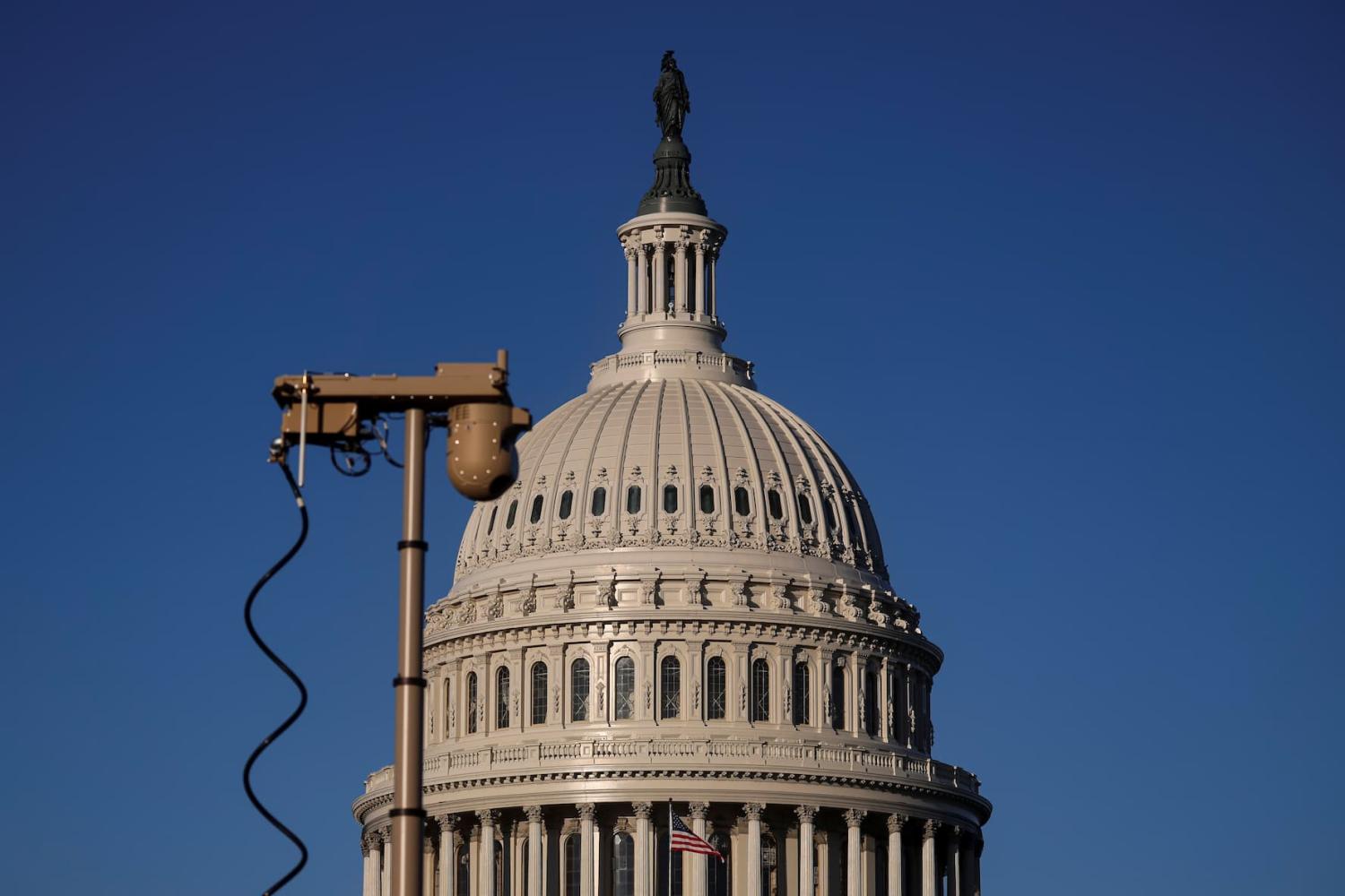 A surveillance camera is seen in front of The U.S. Capitol building during morning hours in Washington, U.S., February 10, 2022.